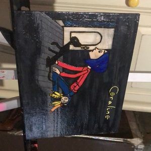 This is a coraline canvas that I made it has this glossy affect to it. <3